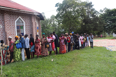 Some of the attendees lining up for outreach registration in western Uganda.