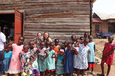 Annika and Linda with children after a service at Karugangama Church.