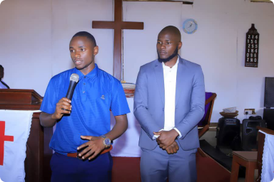 Junior ministering at his home church in Mbarara district.