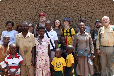TUPS team with local community in Kasese