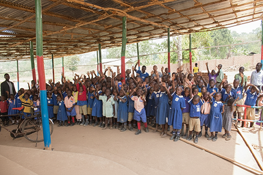 Children at a school during one of Junior’s outreach visits, where he shares the Gospel.