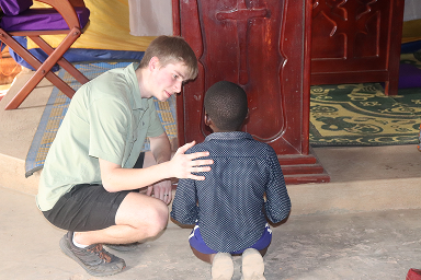 Ben connecting with a child who had committed his life to Christ at Karugangama church